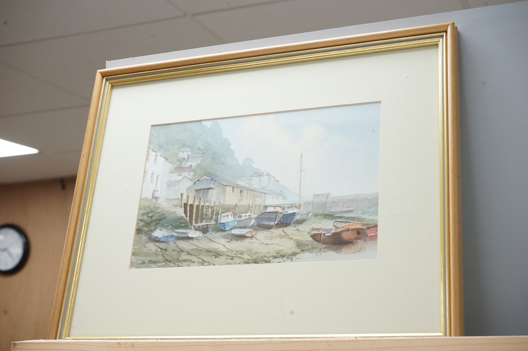 Jim Birt (20th. C), watercolour, Cornish town scene with beached fishing boats, together with R J N Lawson, a similar watercolour dated 1948, 19 x 27cm